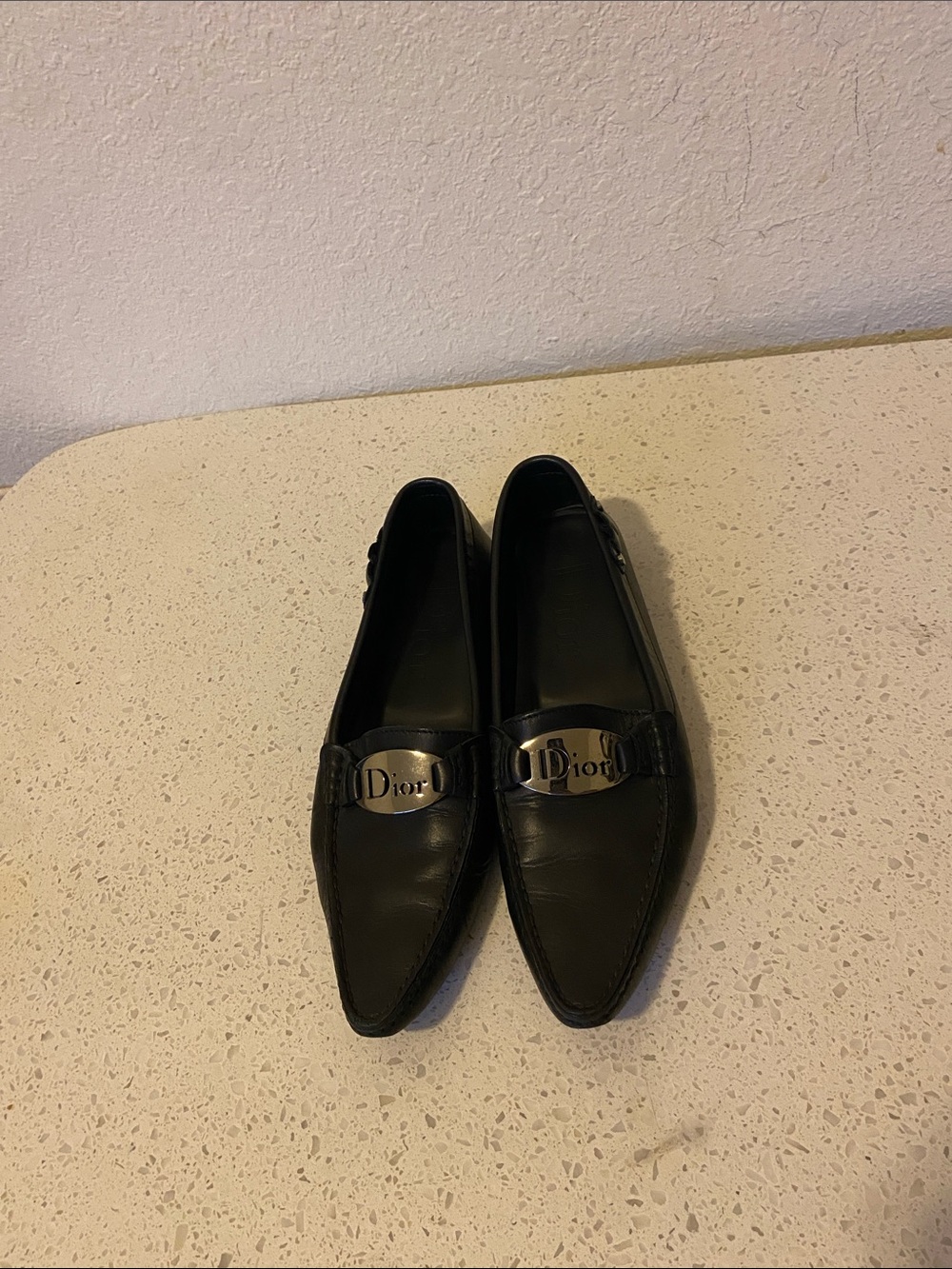 Dior Black Leather Pointed-Toe women’s Loafers with Silver Logo Plaque